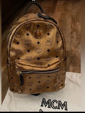 MCM gold small backpack